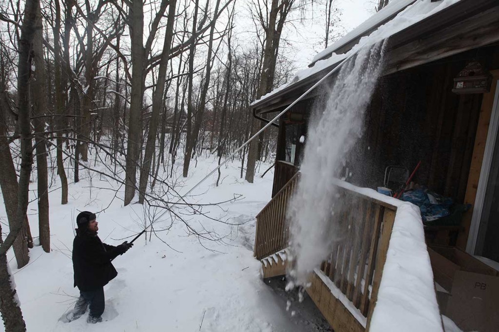 Time to snowrake the roof after years of not needing to